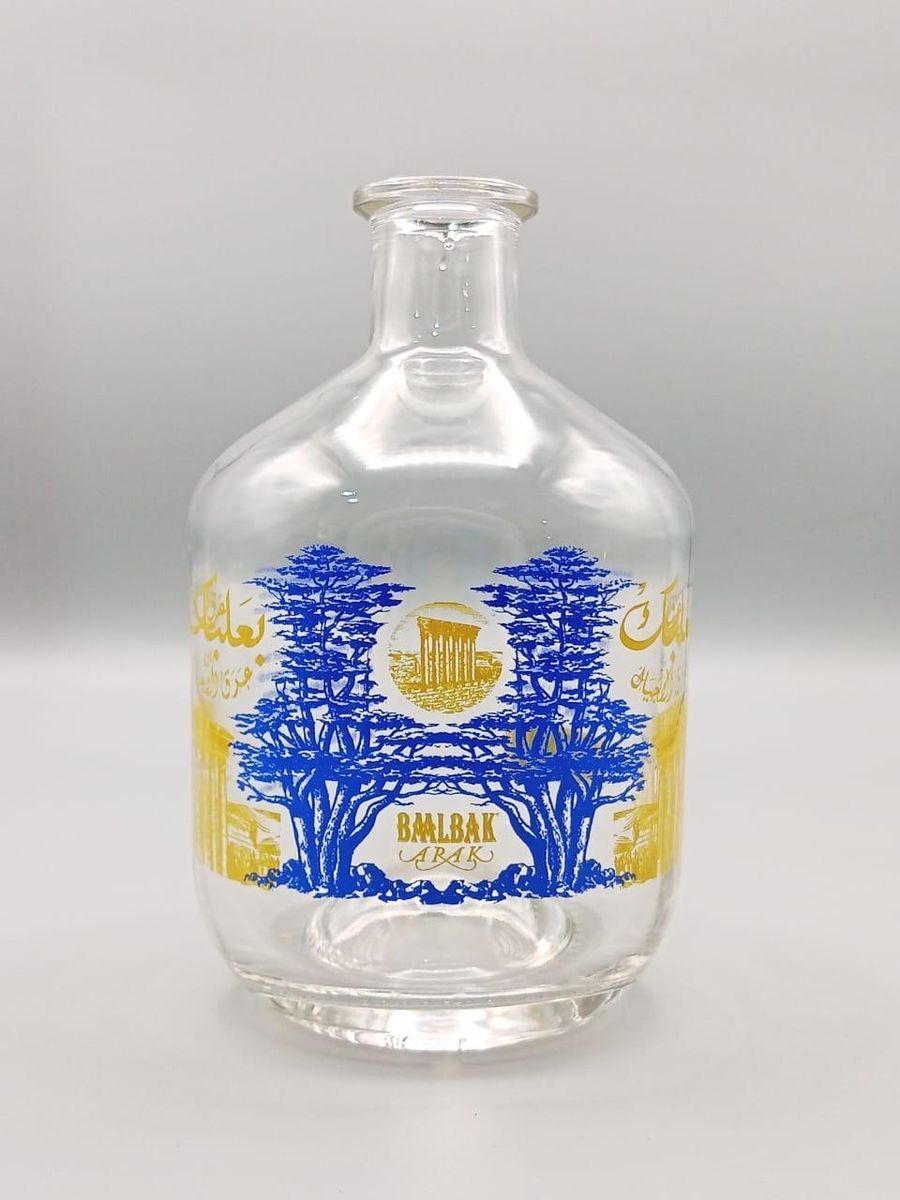 Arak Baalbak glass bottle with blue and yellow cedar print