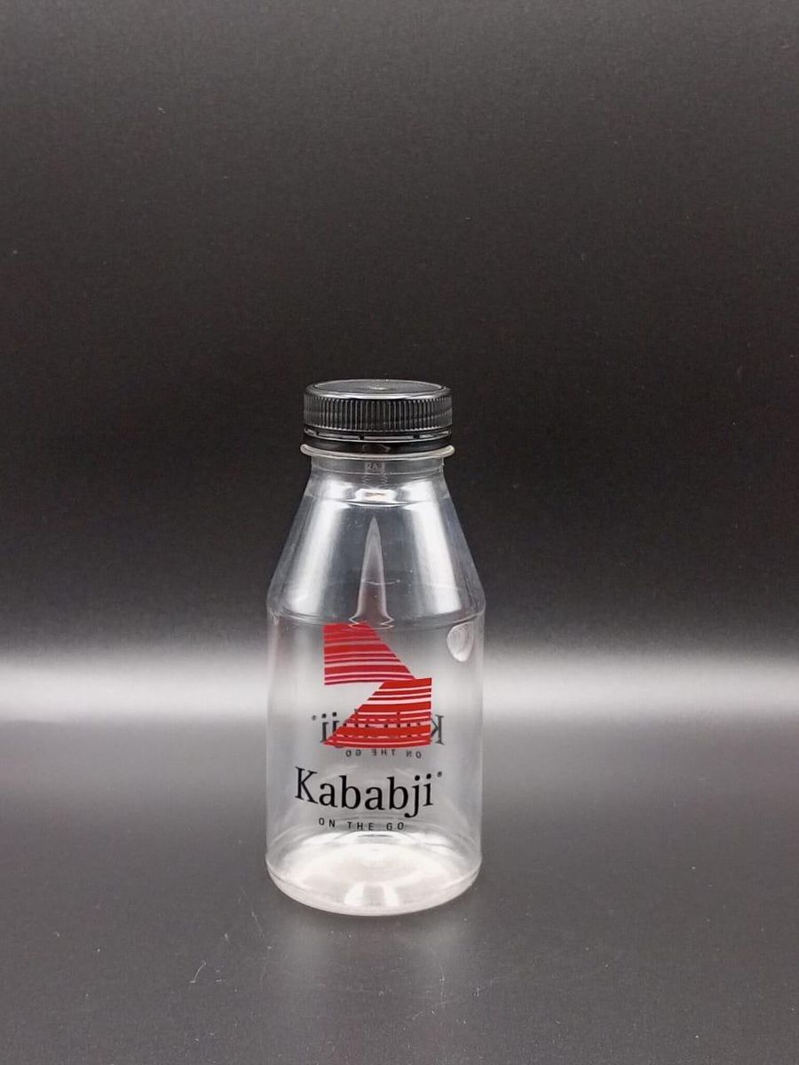 Kababji ayran bottle, red print on clear plastic
