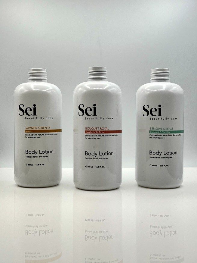 Sei body lotion bottles, white plastic